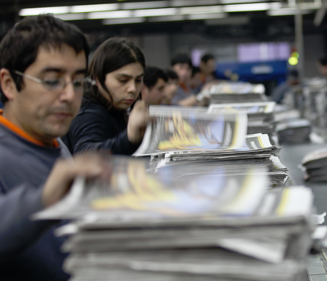 Newspaper on an assembly line