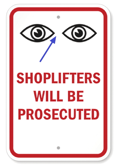 Eyes in anti shoplifting signs