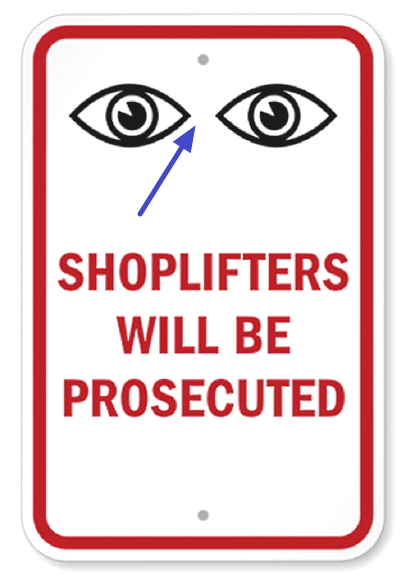 Eyes in anti shoplifting signs